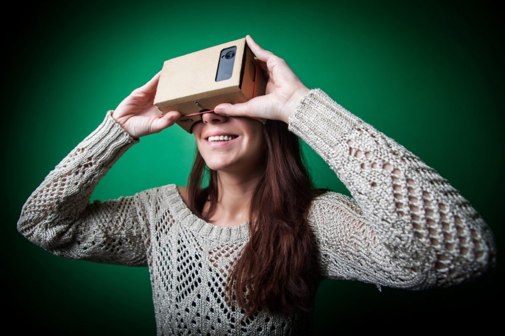 A woman using Google Cardboard - Copy