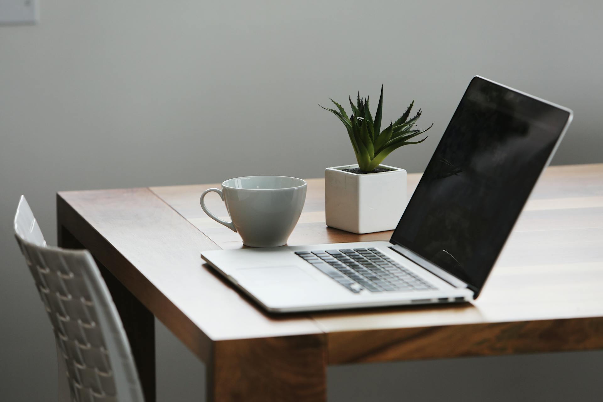 A laptop on a table.