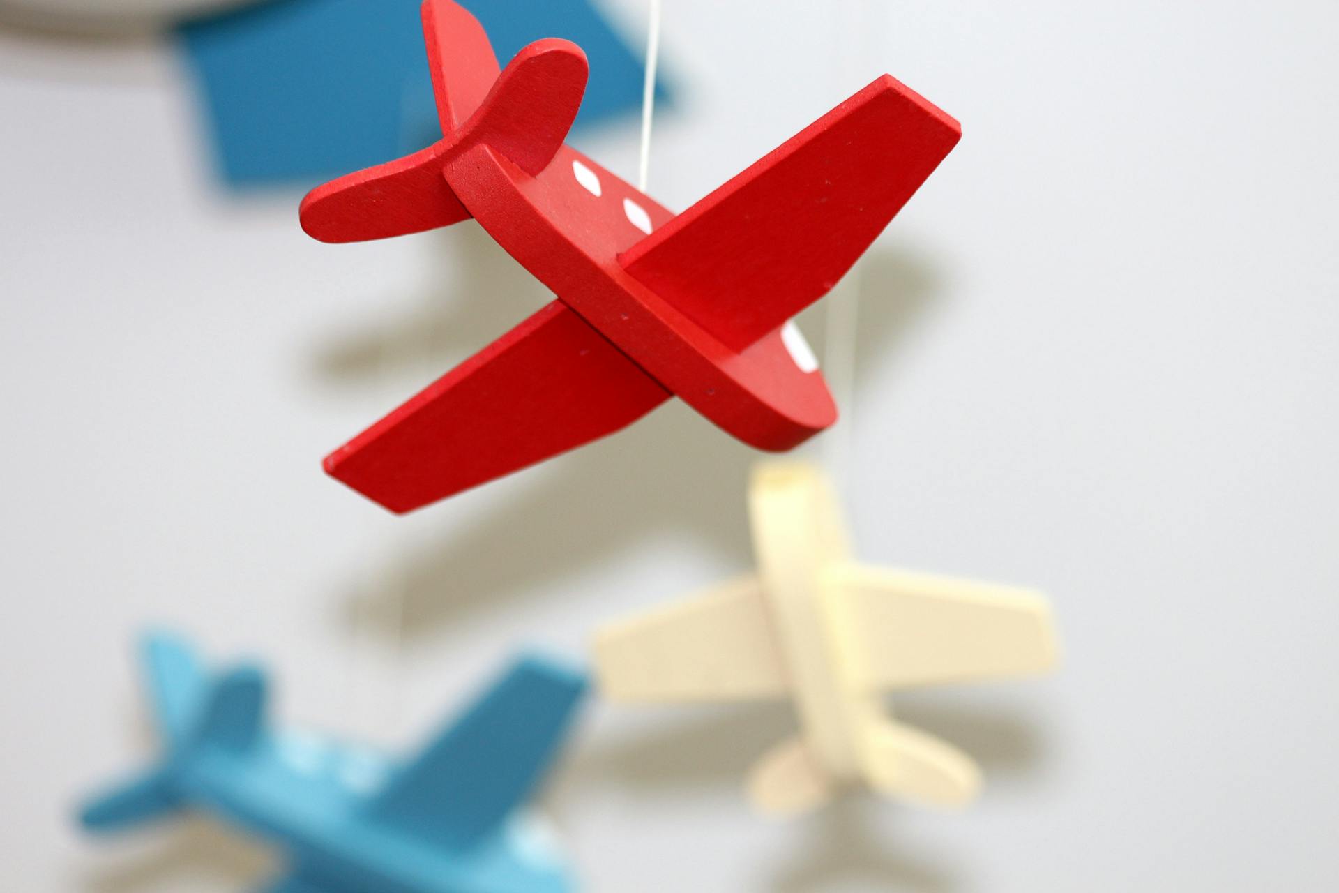 Toy airplanes hanging in a child's room