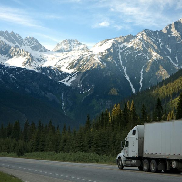 A truck driving through the mountains.