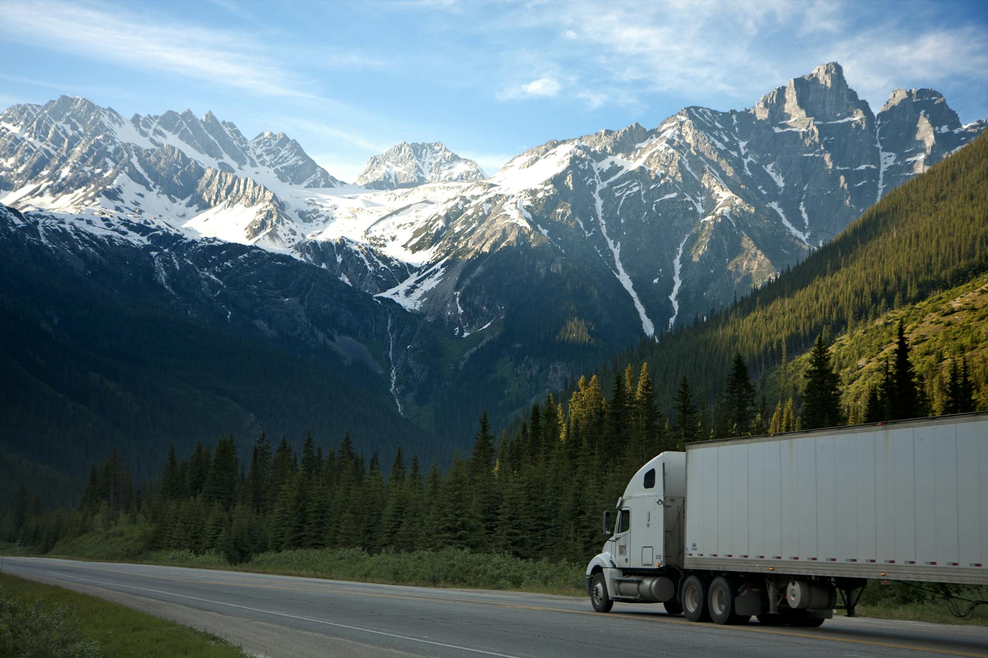 A truck driving through the mountains.